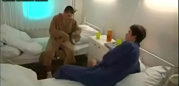  Two patients and doctor in the infirmary